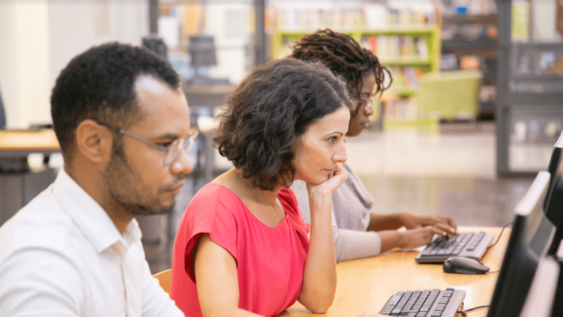 Students learning at computer.