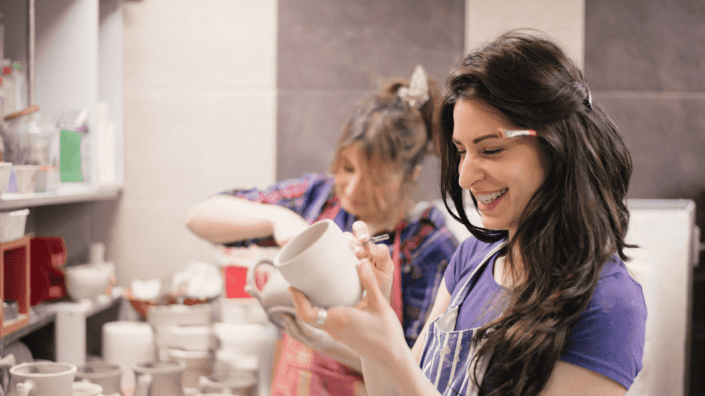 Student enjoying pottery.