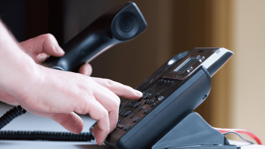 Hand dialling on a desk phone