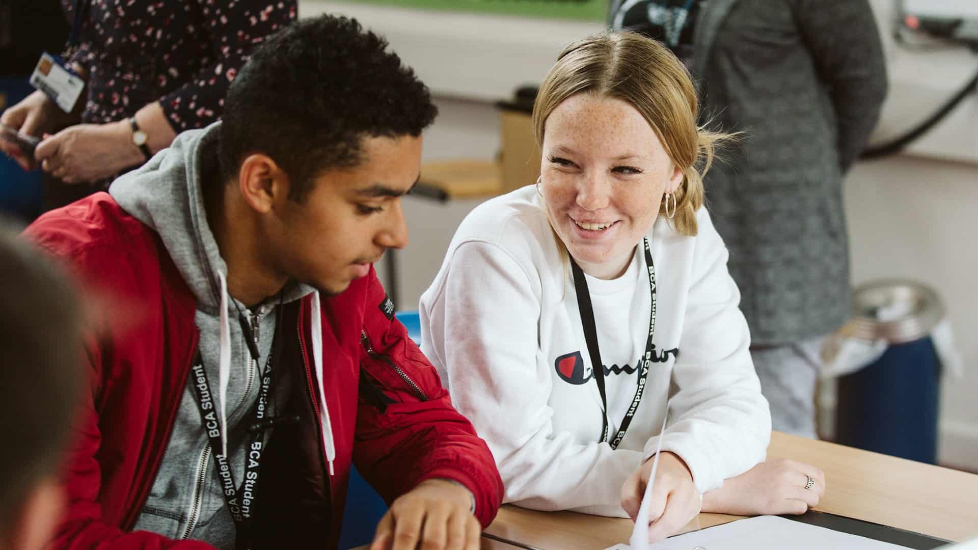 business studies students laughing