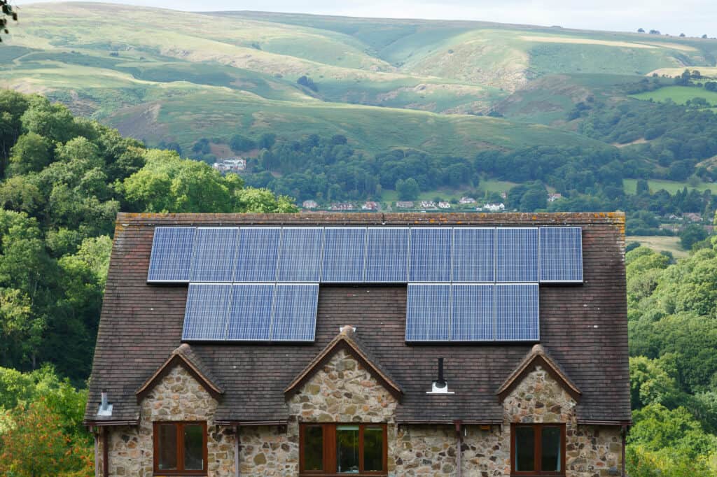 Small cottage with solar panels