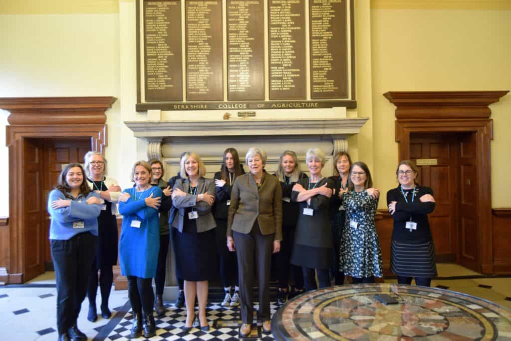 Staff and students with Theresa May