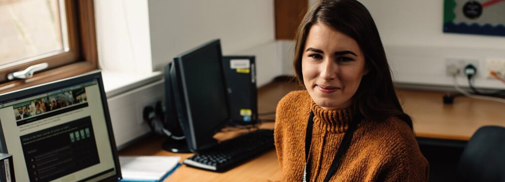 Older student at computer