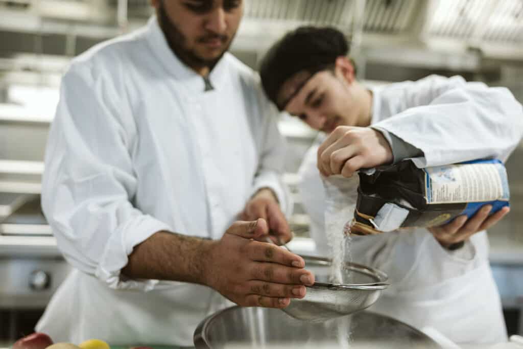 Catering students preparing meal