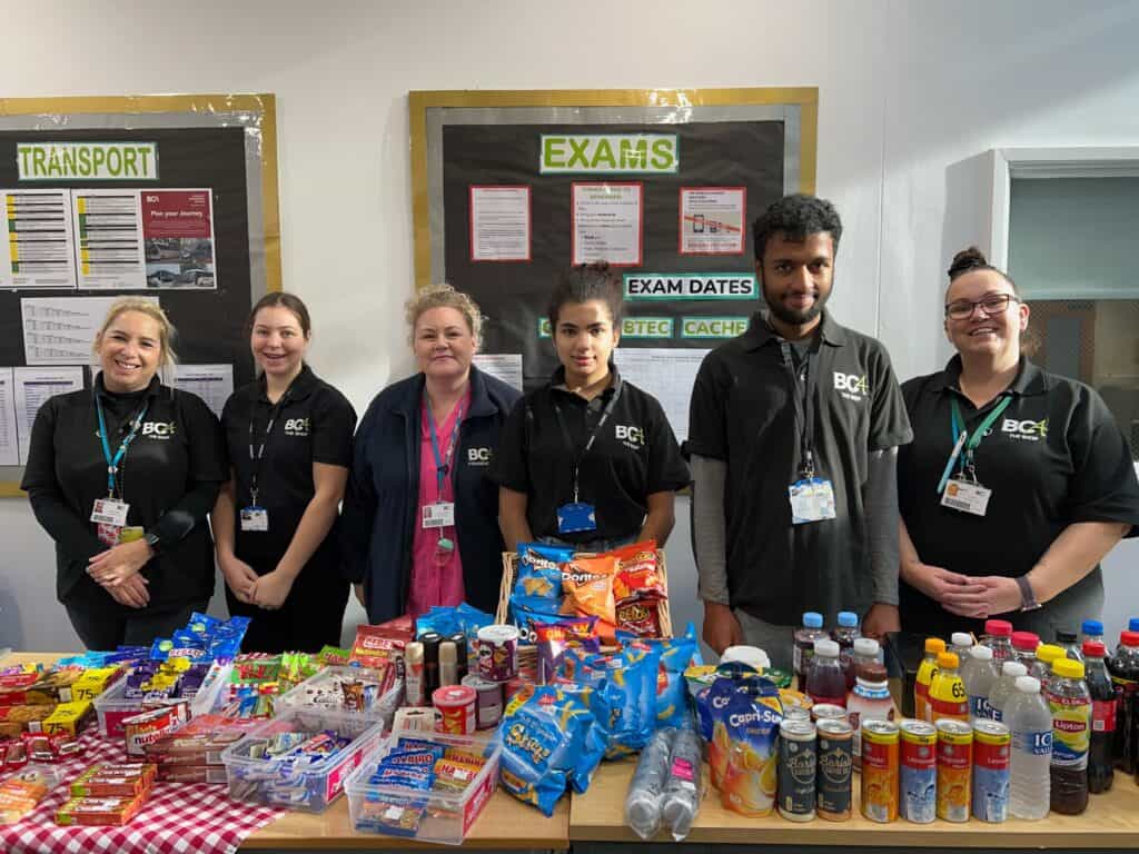 students serving snacks and drinks