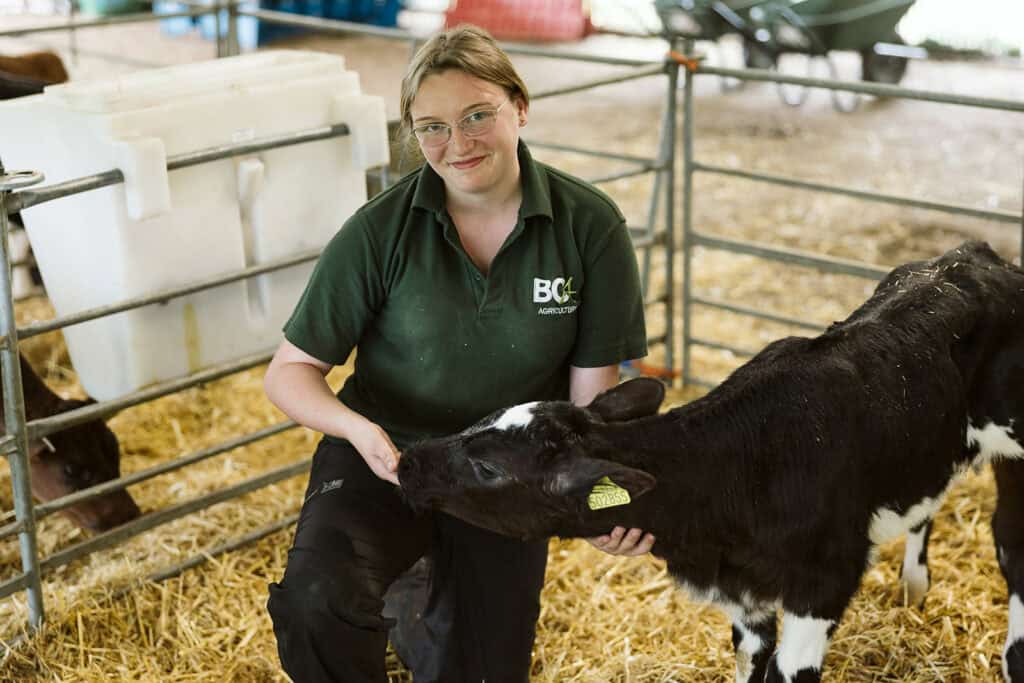 student with a goat