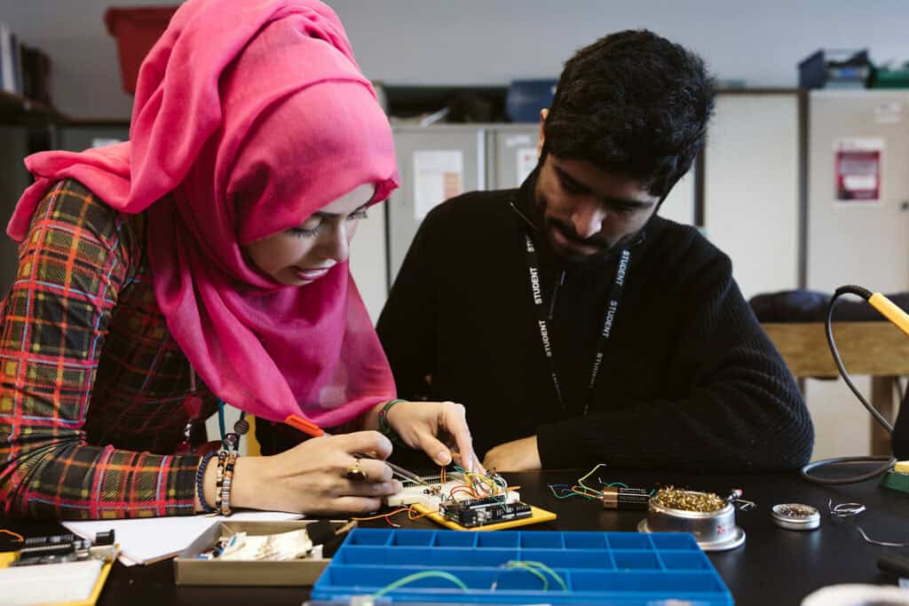 tutor with engineering student