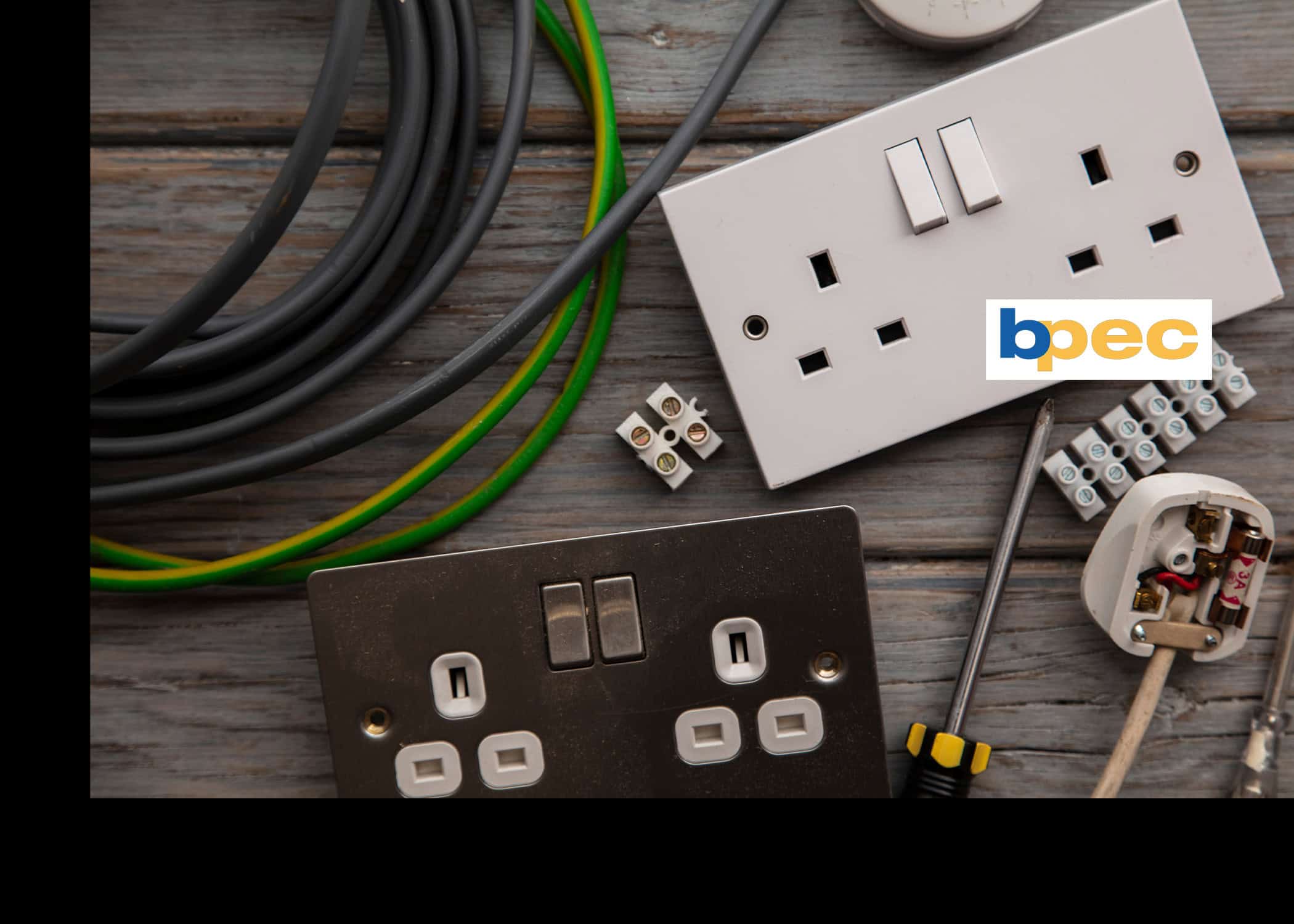 An image of plugs, wires and fuses