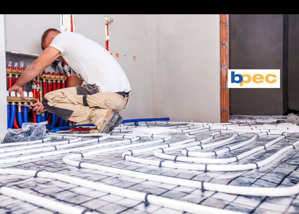 Man installing underfloor heating