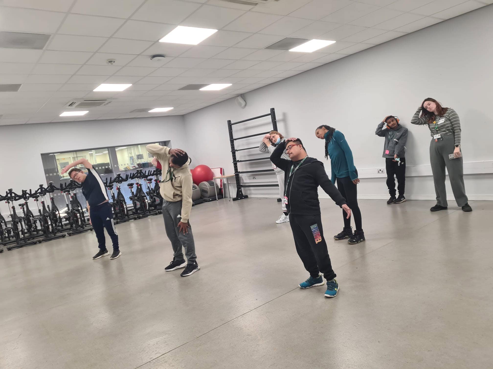 A class of ALFIE students stretching