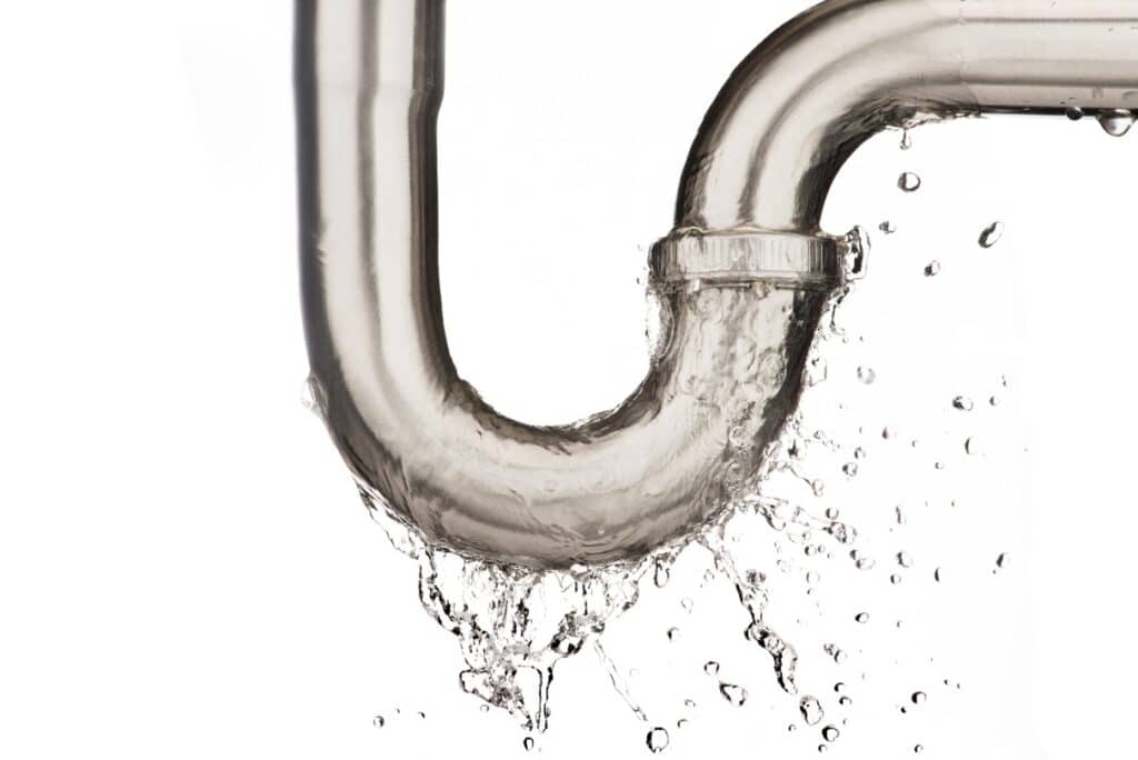 A water pipe with water splashing it