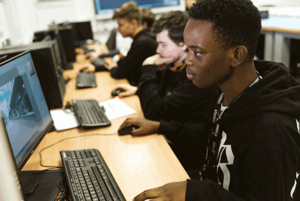 students sat at computer