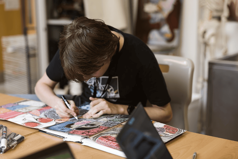 student with art work