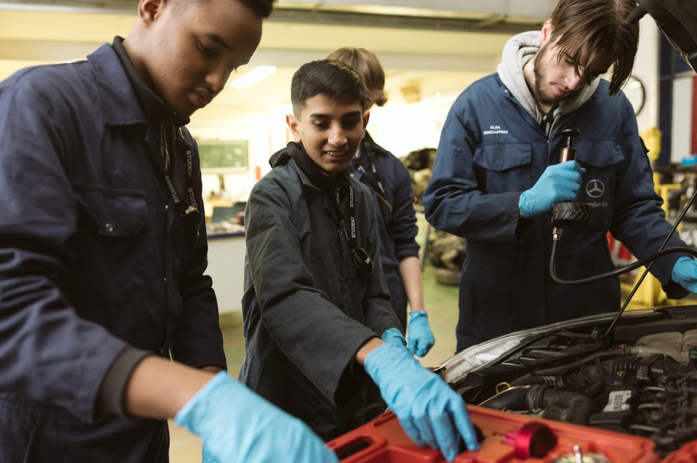 motor vehicle students with a car