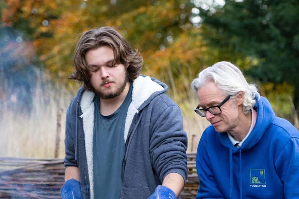 Alfie student and teacher working