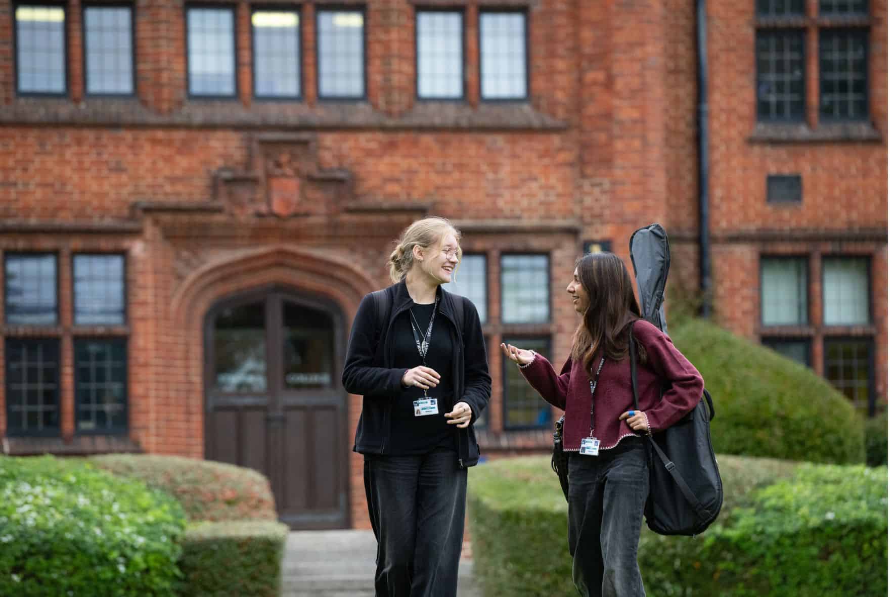 2 students outside Strode's
