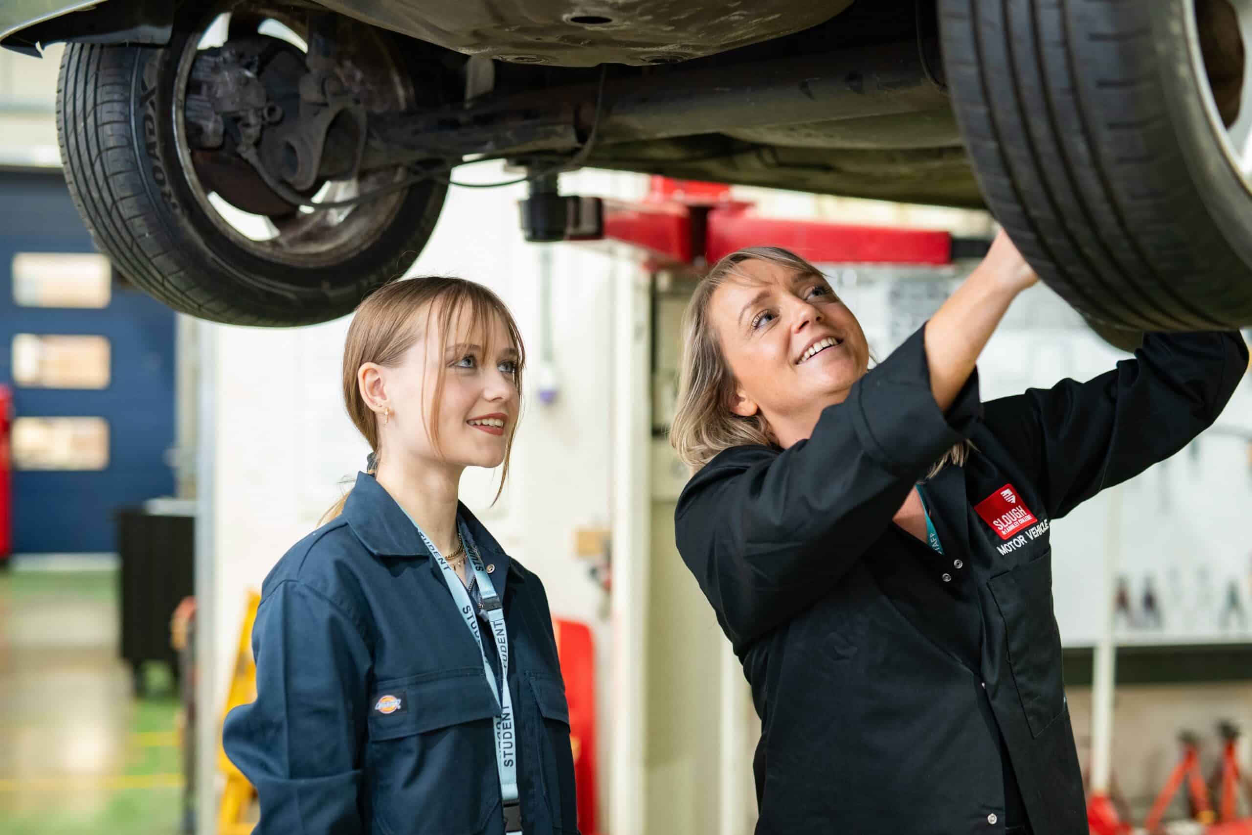 female motor vehicle student and teacher