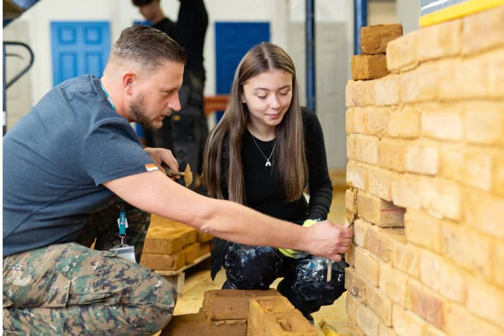 bricklaying teacher demonstrating