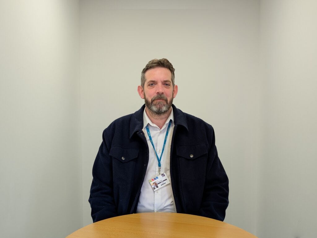 A photo of David Bradshaw smiling to the camera