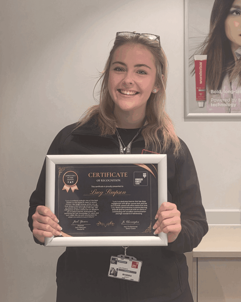 Apprentice of the Month with her certificate