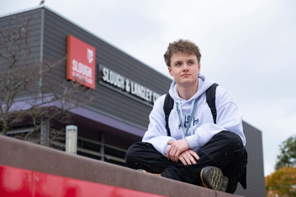 Boy in front of the college