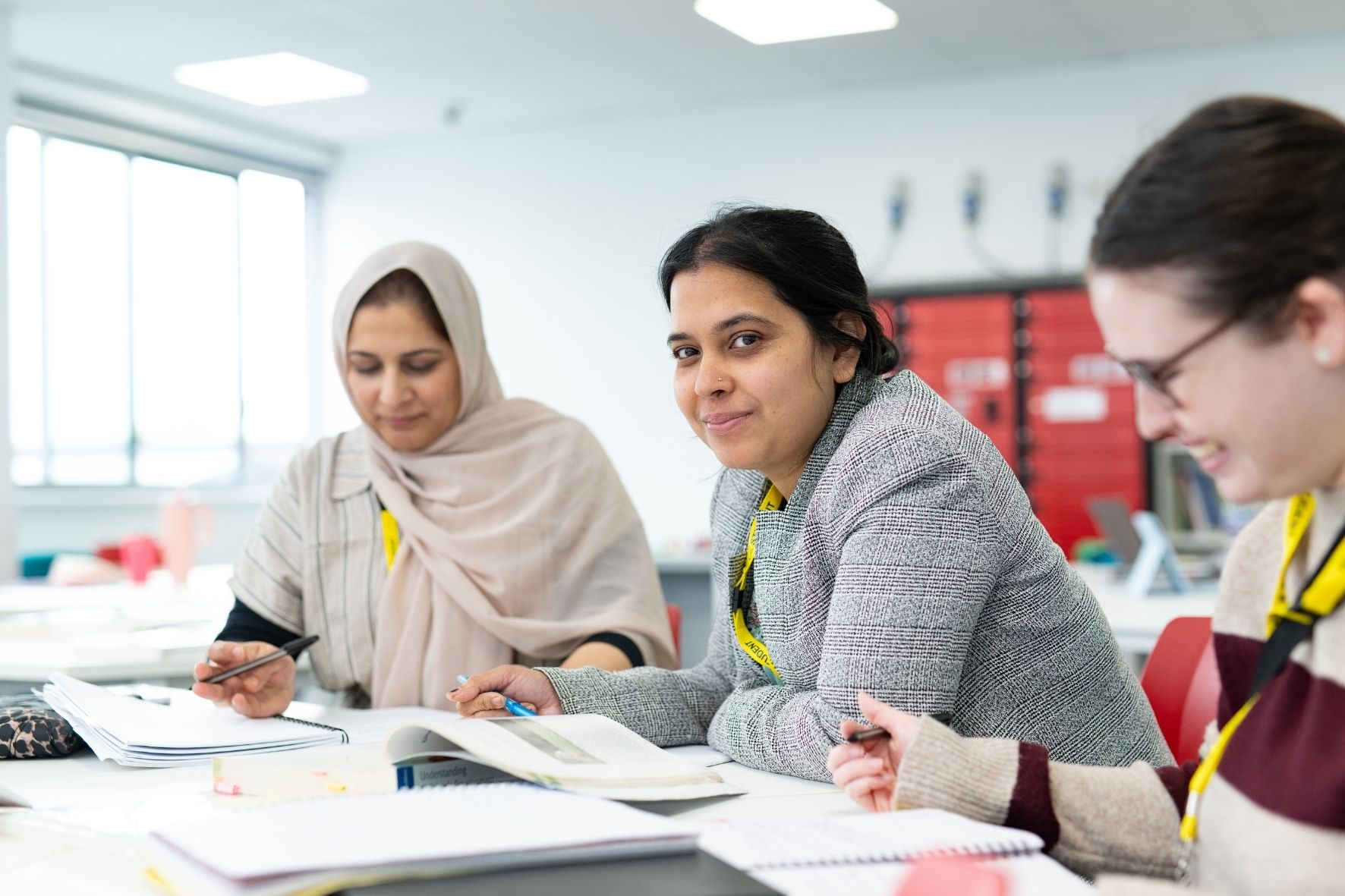 HE students working at a desk