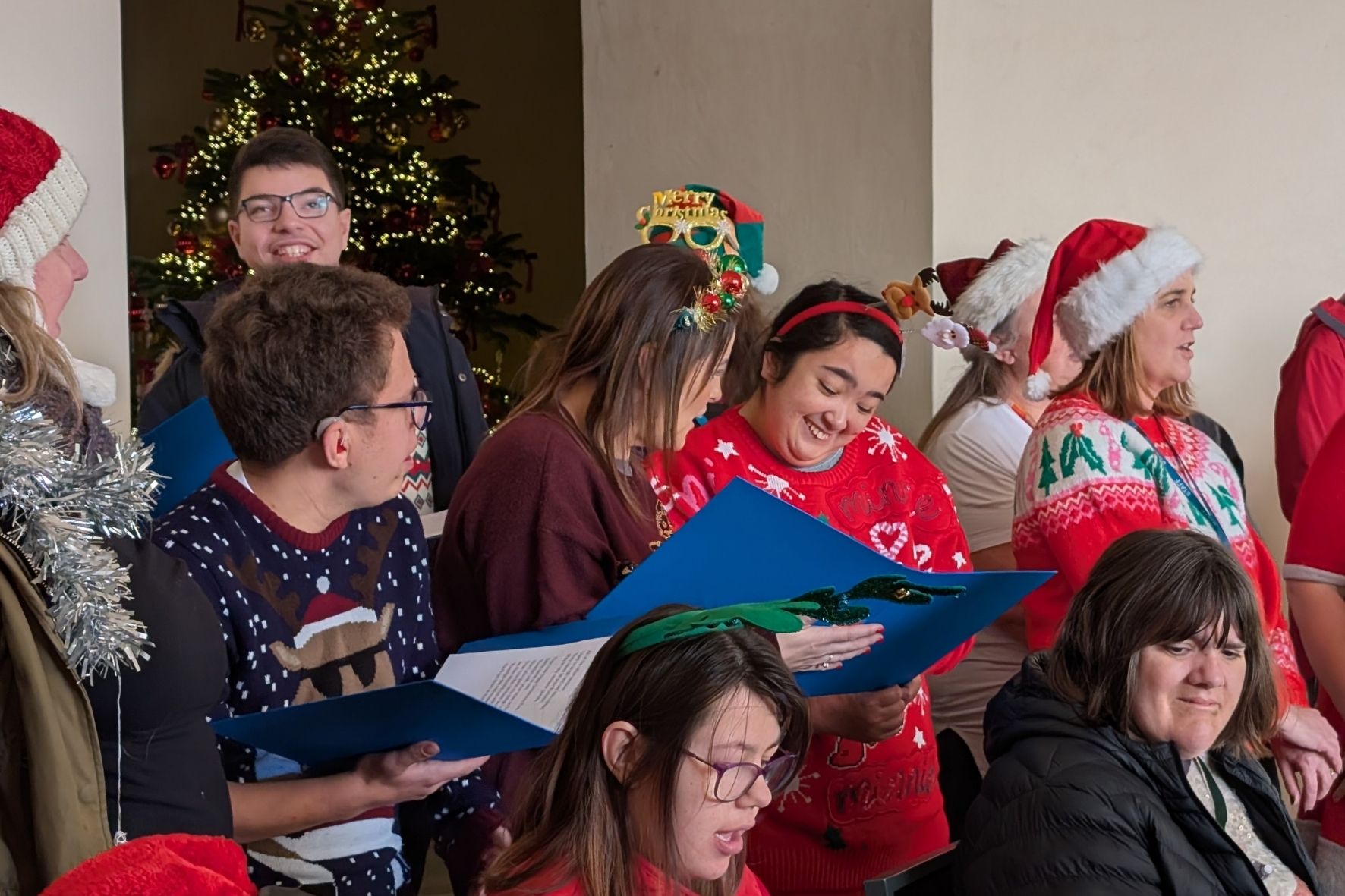 Alfie students singing christmas carols in a choir