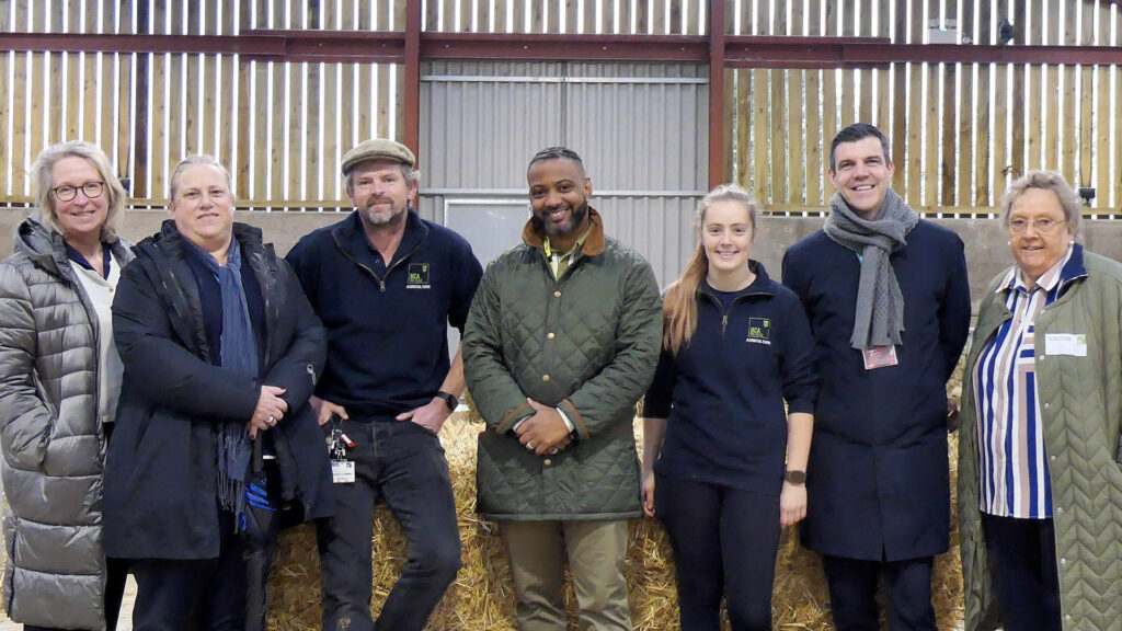 JB Gill with six staff members in the new barn at BCA