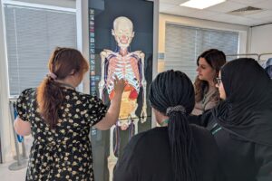 Students stood around the Anatomage Table