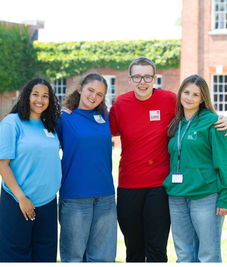 4 students smiling
